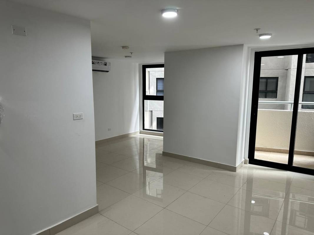 Minimalist living room with sliding balcony door PH Vía España Tower Panama