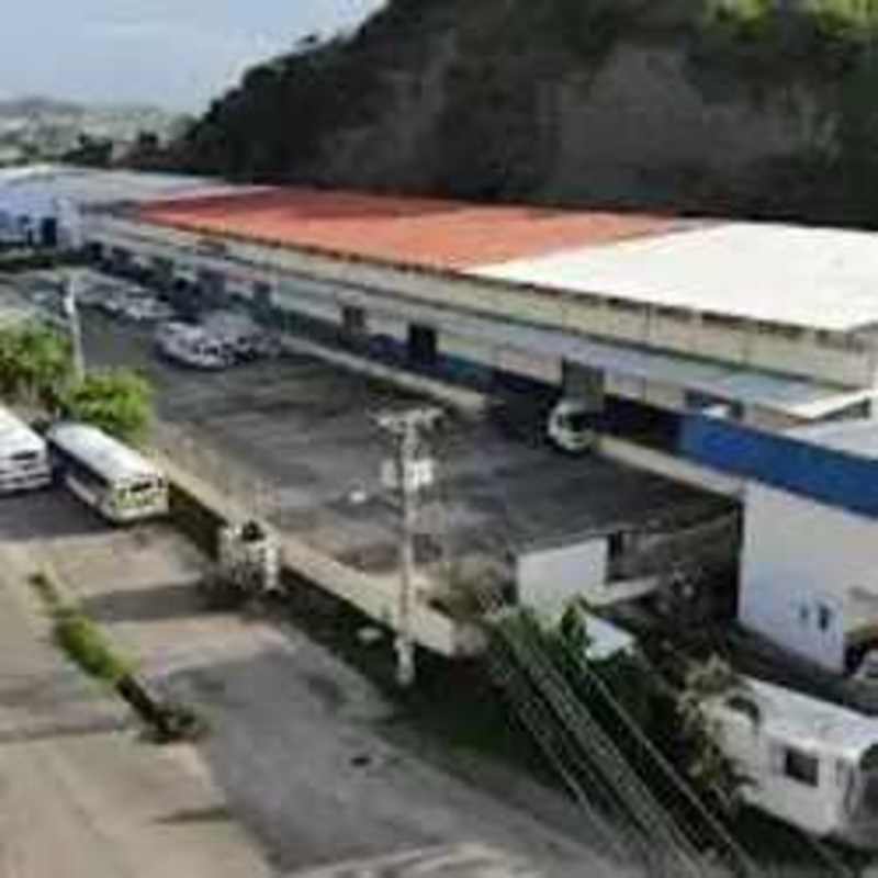Aerial view large industrial warehouse complex with parking near Costa del Este Panama City