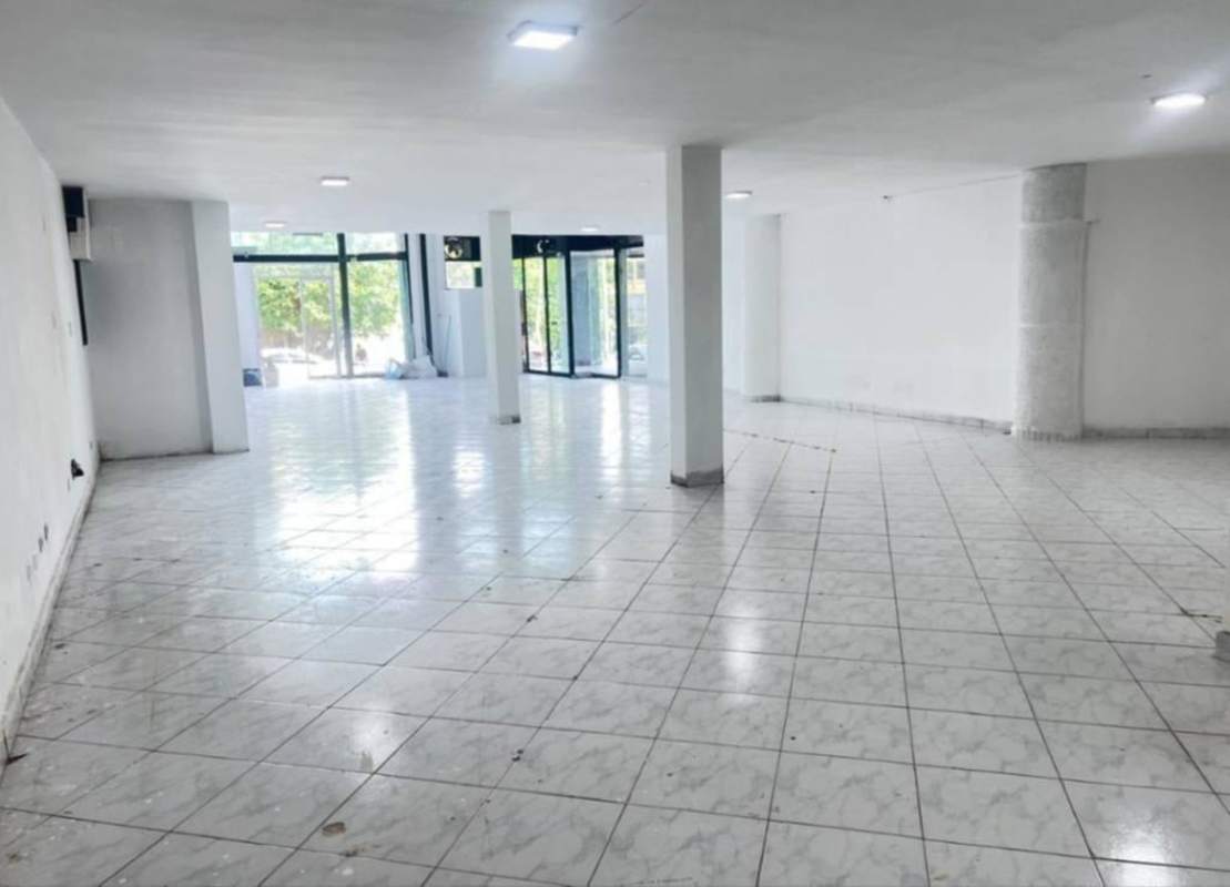 Modern commercial space with glass facade and open interior in busy Obarrio Calle 50 Panama