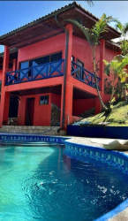 Bedroom with window mountain views tiled floors wood bed Altos de María Panama