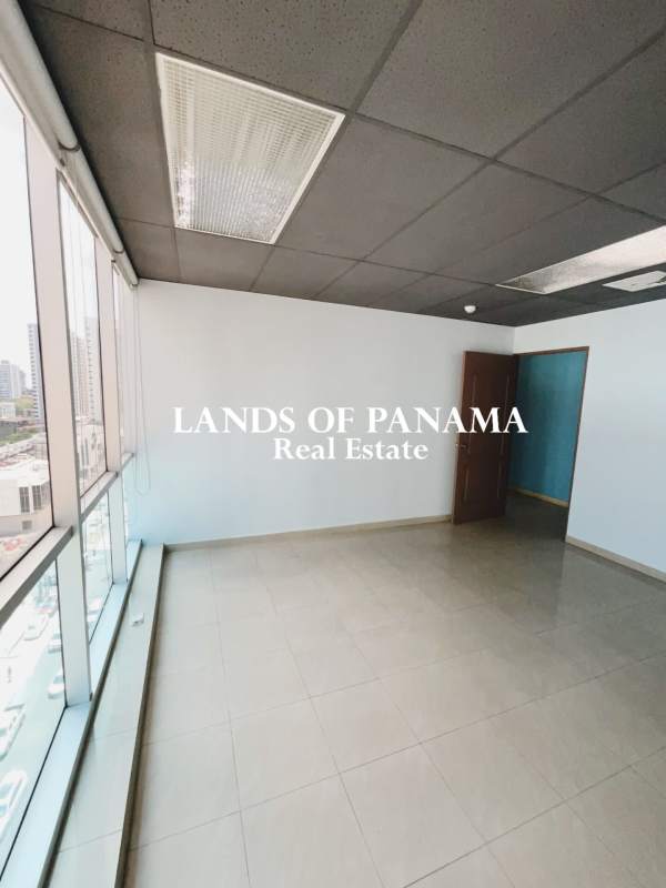 Reception area with granite counter and accent wall inside Hi Tech Plaza Panama City