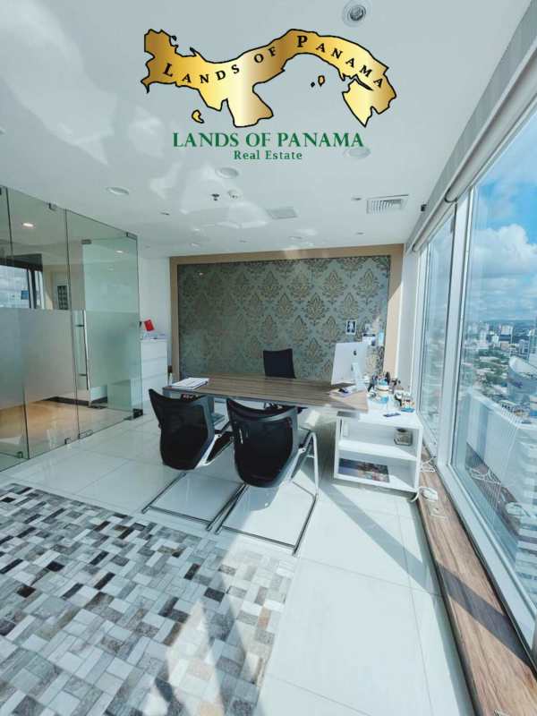 Contemporary glass-partitioned conference room overlooking Panama City skyline