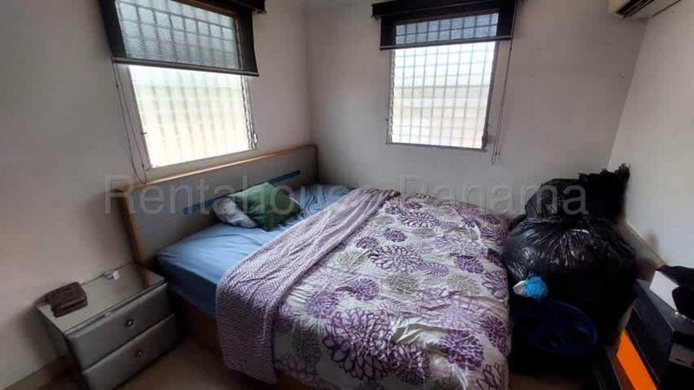 Contemporary bathroom black toilet and glass shower Condado del Rey Panama