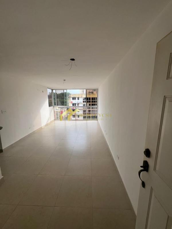 Bright hallway connecting bedrooms and living at PH Torres de Toscana Condado del Rey