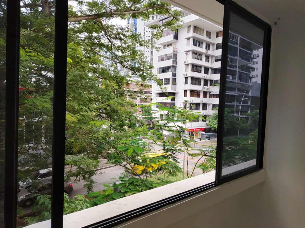 Panoramic cityscape view from window at PH Aurora El Cangrejo Panama