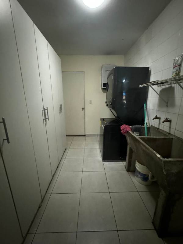 Covered patio with BBQ and garden area Villas Castel Novo Juan Díaz Panama