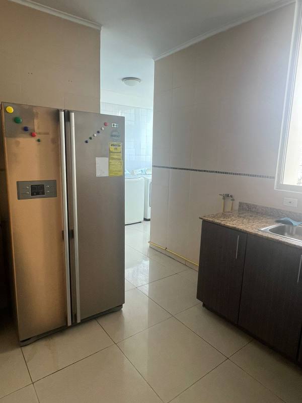 Laundry area with washer dryer hookups maid bath window at PH The Palm Obarrio