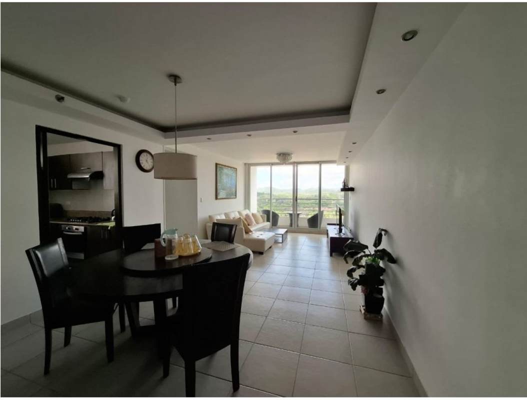 Dining table in open plan apartment with kitchen and living room PH Clayton Park I