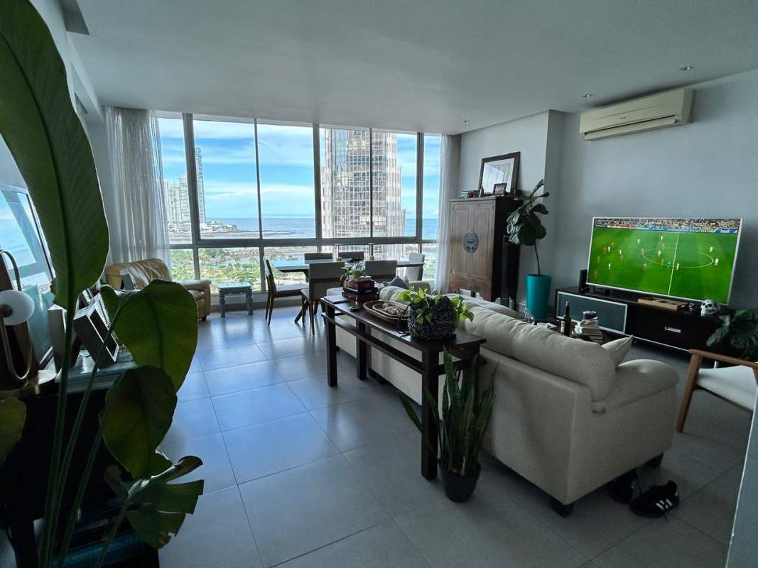 Modern bright living space with floor windows, porcelain floors, panoramic bay views PH Vista Marina Panama