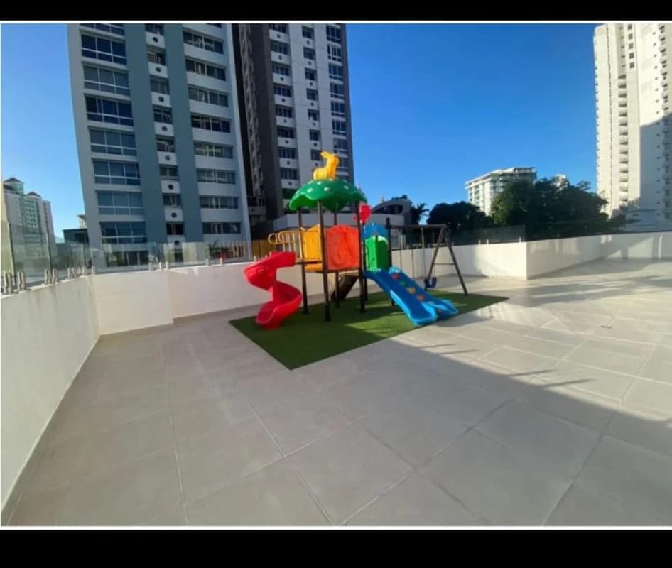 Modern minimalist bathroom with glass shower enclosure and vanity at PH Sky Swiss El Cangrejo Panama