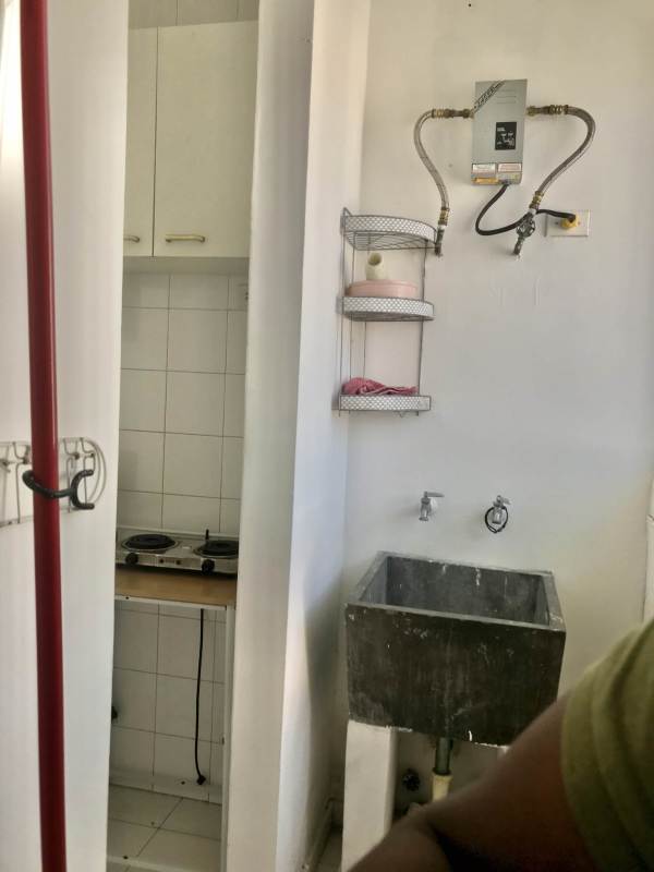 Bathroom with glass shower enclosure modern fixtures in PH Royal Center Marbella Panama