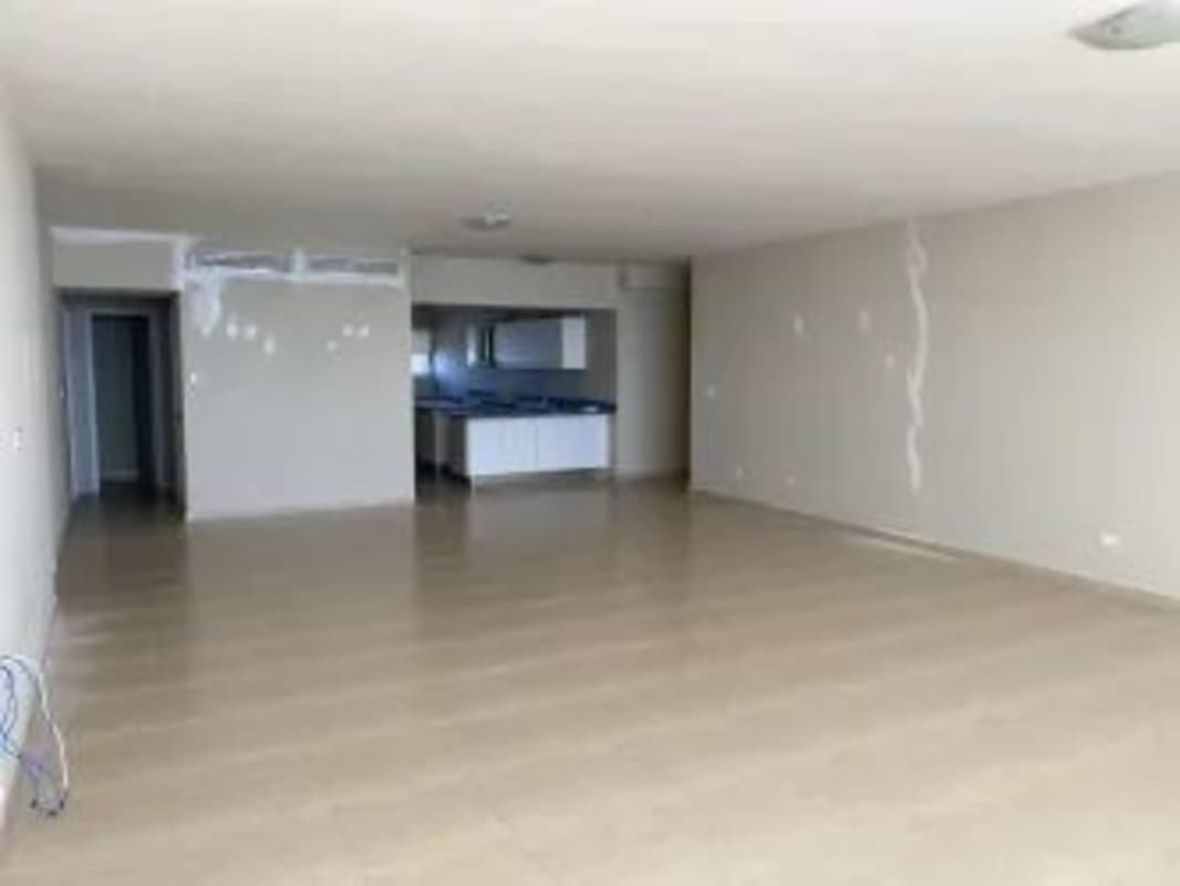 Empty luxury living room with large ocean view windows PH Yoo Panama