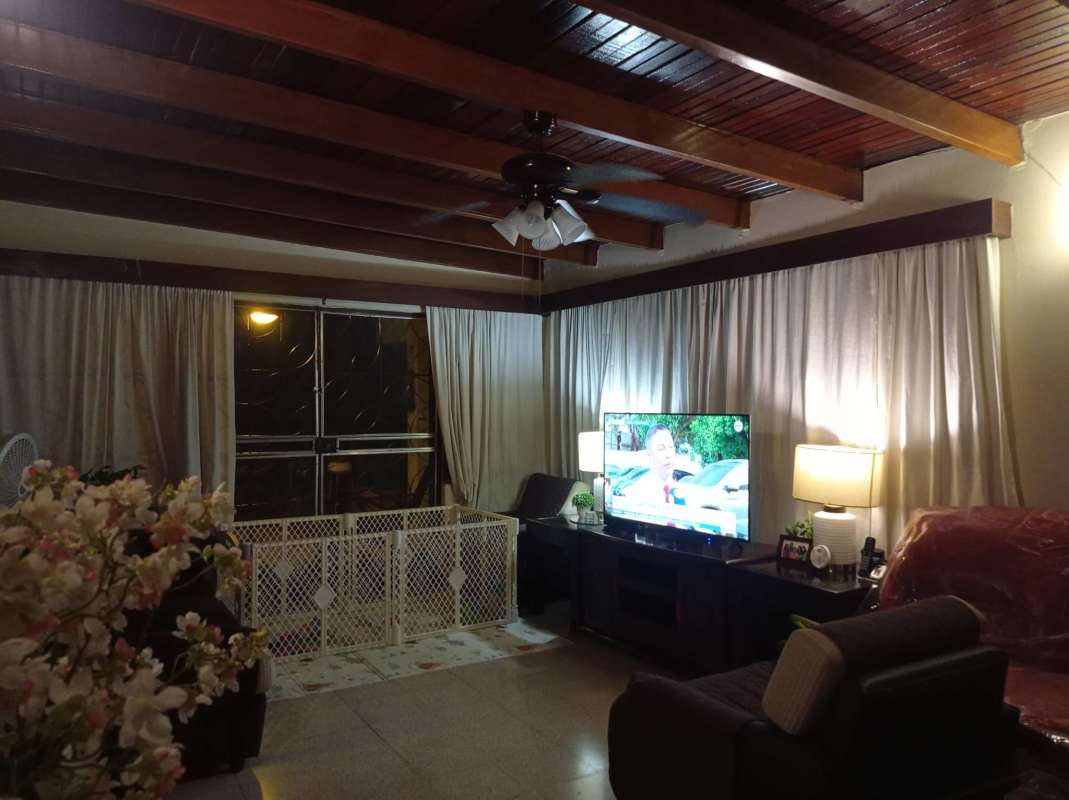 Vintage bathroom with green tiles pedestal sink shower Betania house Panama