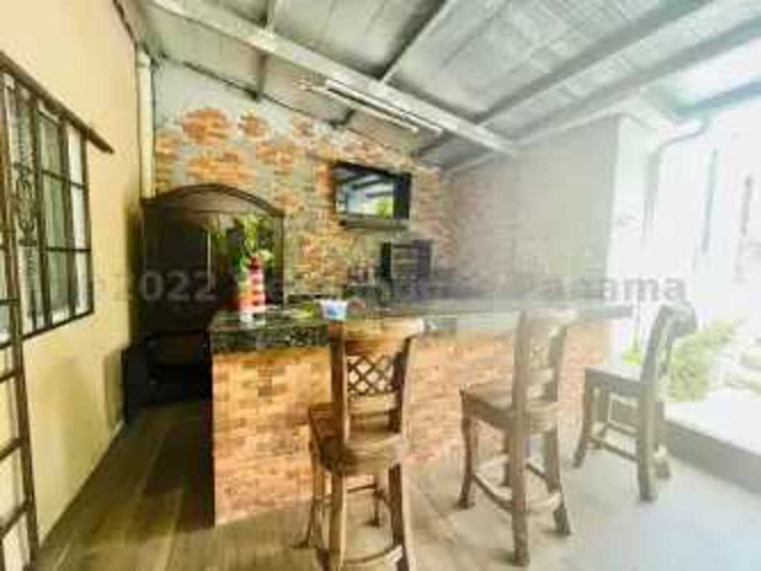 Contemporary kitchen with granite countertops, dark cabinetry, stainless appliances El Doral Panama