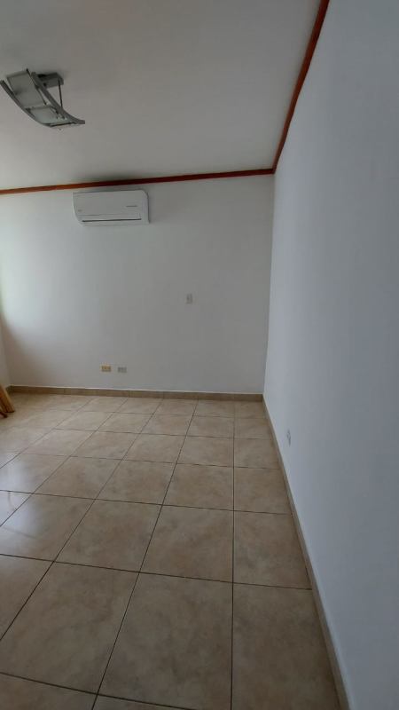 Bathroom with walk-in shower and tile walls in Green Park Towers Altos del Chase Panama