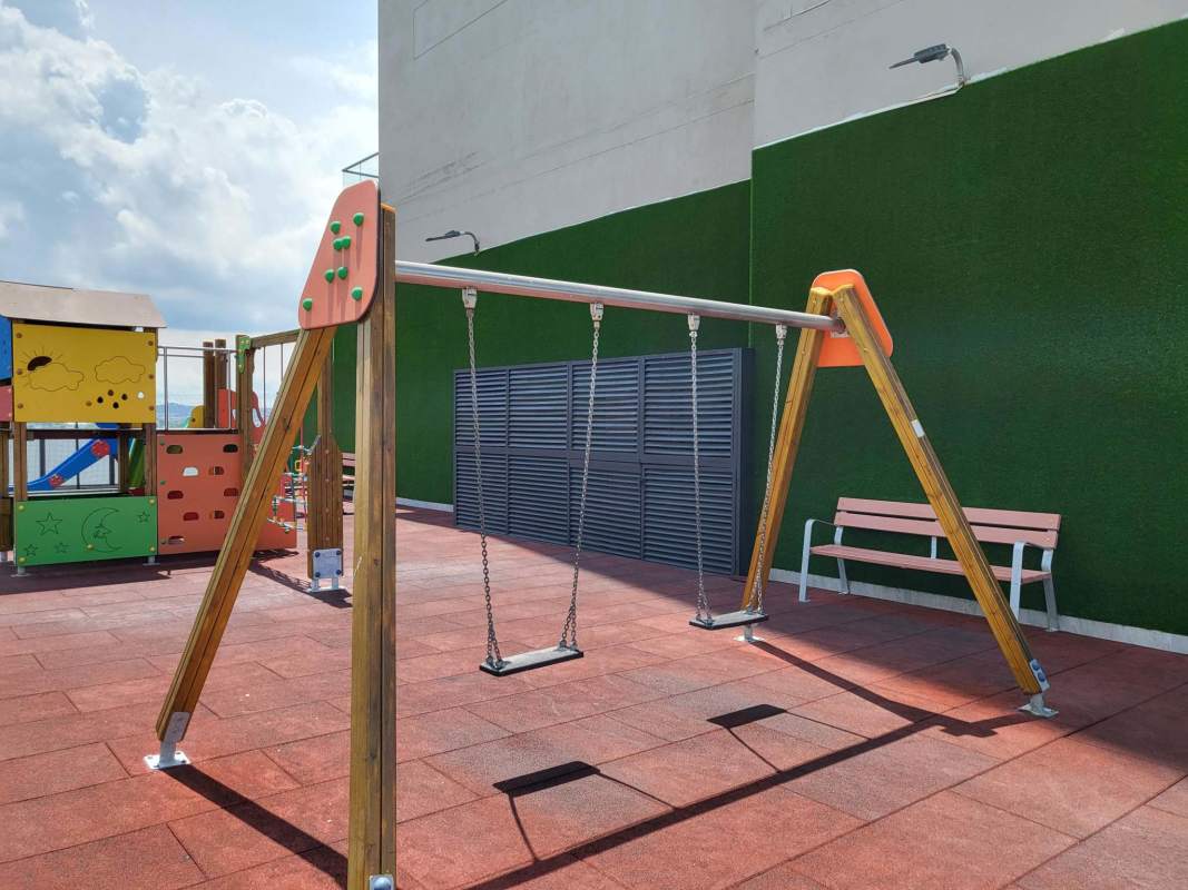 Spacious living area with large panoramic balcony in The Reserve Santa María Panama City