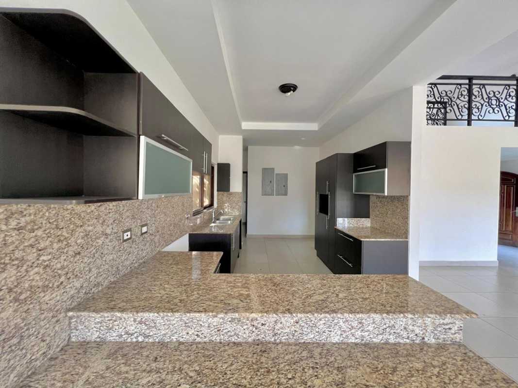 Modern granite kitchen with appliances Costa Sur gated community Panama