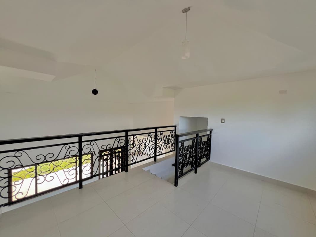 Beautiful Mediterranean exterior design with covered porch and arched doors Costa Sur