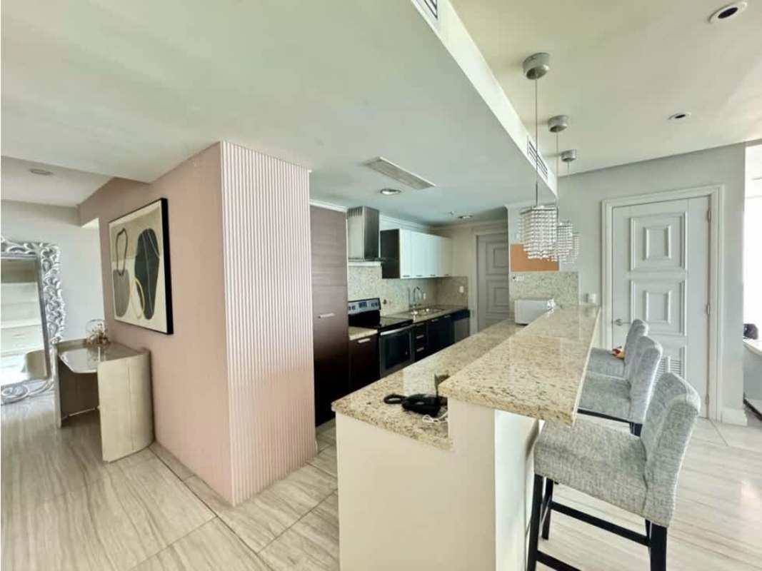 Modern kitchen with granite countertops and stainless appliances in Oceanaire Punta Pacifica
