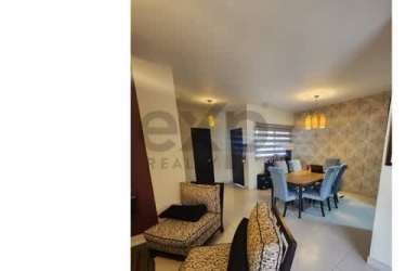 Contemporary living room with sectional sofa, wall art, tiled floor in Woodlands Panama Pacifico duplex
