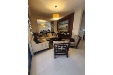 Kids bedroom with bunk bed, desks, bright window in Woodlands Panama Pacifico duplex house