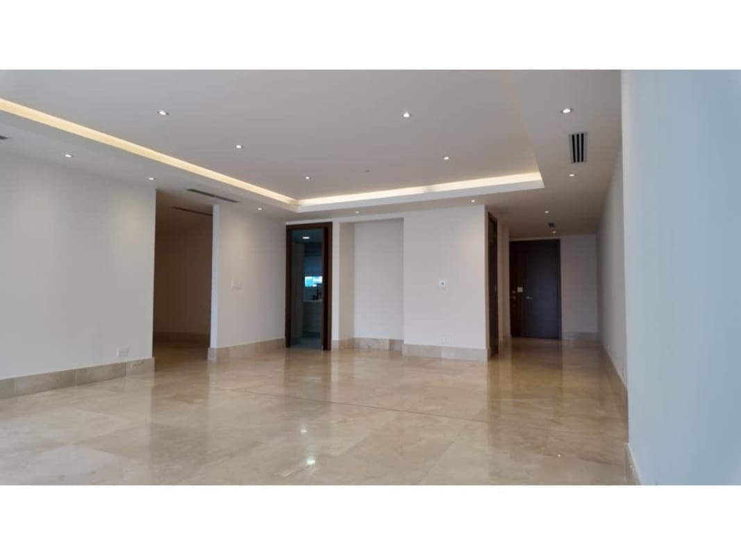 Spacious master bedroom with balcony access overlooking golf course at The Reserve Santa María Panama