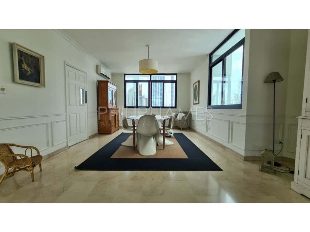 Elegant living room with marble floors, large windows, balcony access in PH Brisas de Marbella Panama City