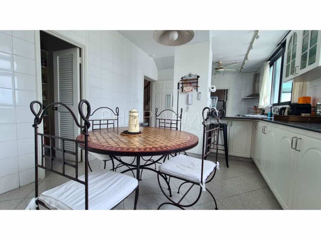 Spacious dining room with marble floors, large windows in PH Brisas de Marbella Panama