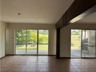 Spacious living room with sliding glass doors golf course view Costa Blanca Royal Decameron Panama