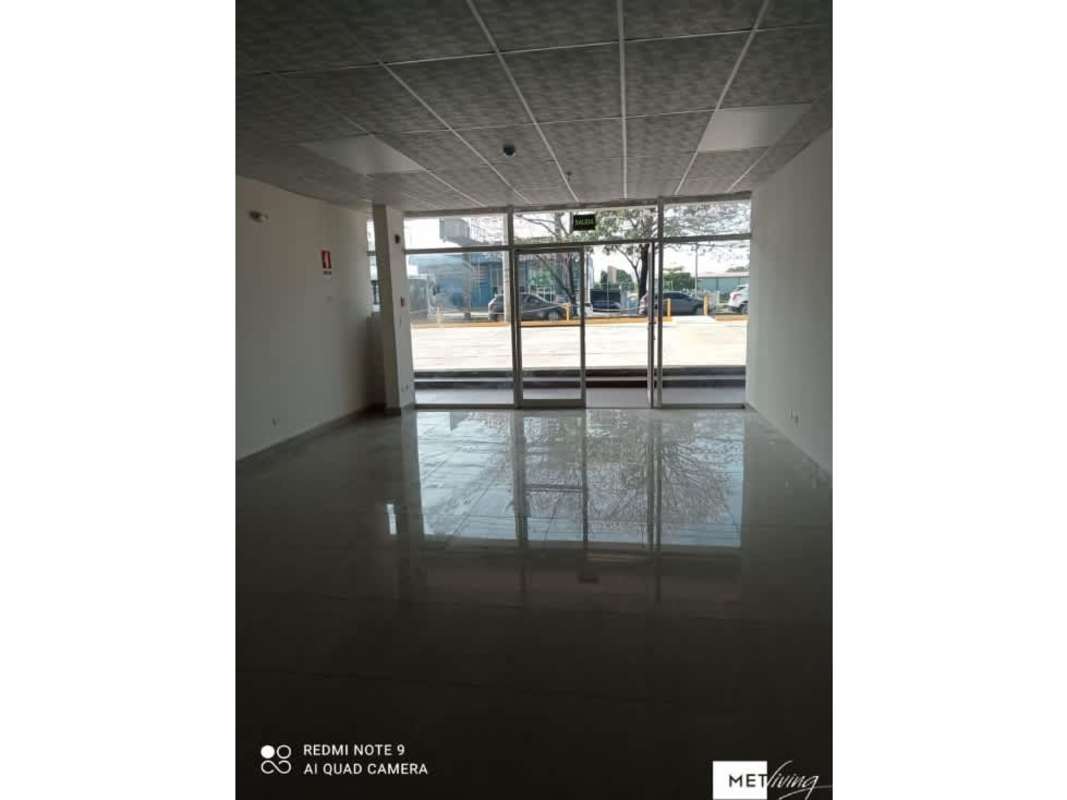 Glass entrance doors of commercial unit with tiled floors at Centro Empresarial Tumba Muerto Panama