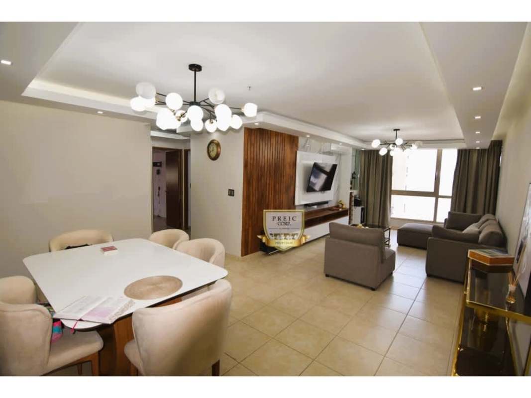 Modern kitchen with marble backsplash, oven and fridge at PH San Francisco Bay Panama