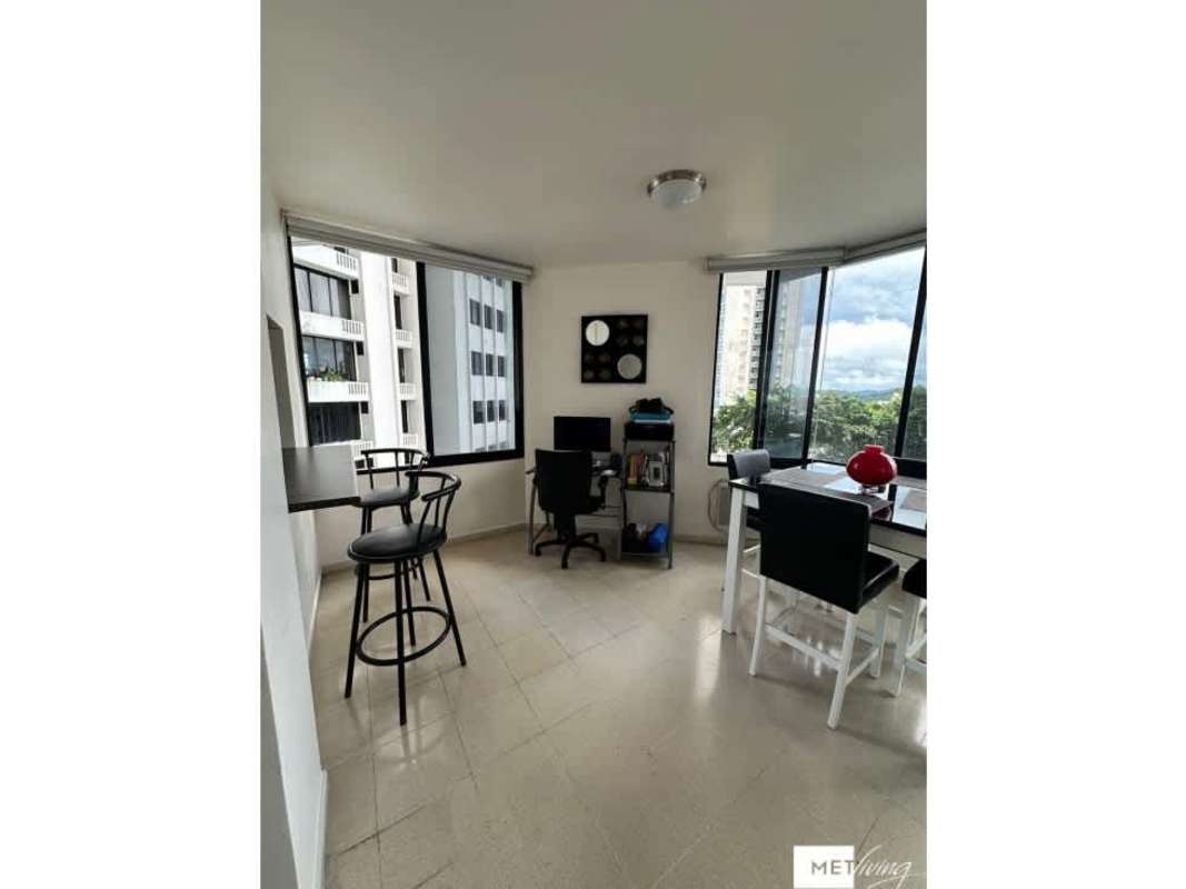 Bathroom with granite countertop, vessel sink, large mirror, urban apartment PH Pacific Hills