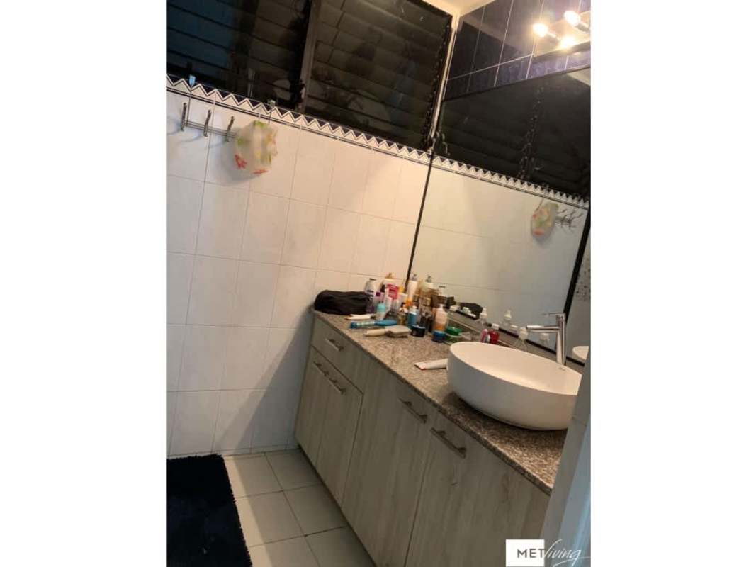 Corner room with panoramic windows used as dining and workspace PH Pacific Hills Panama City