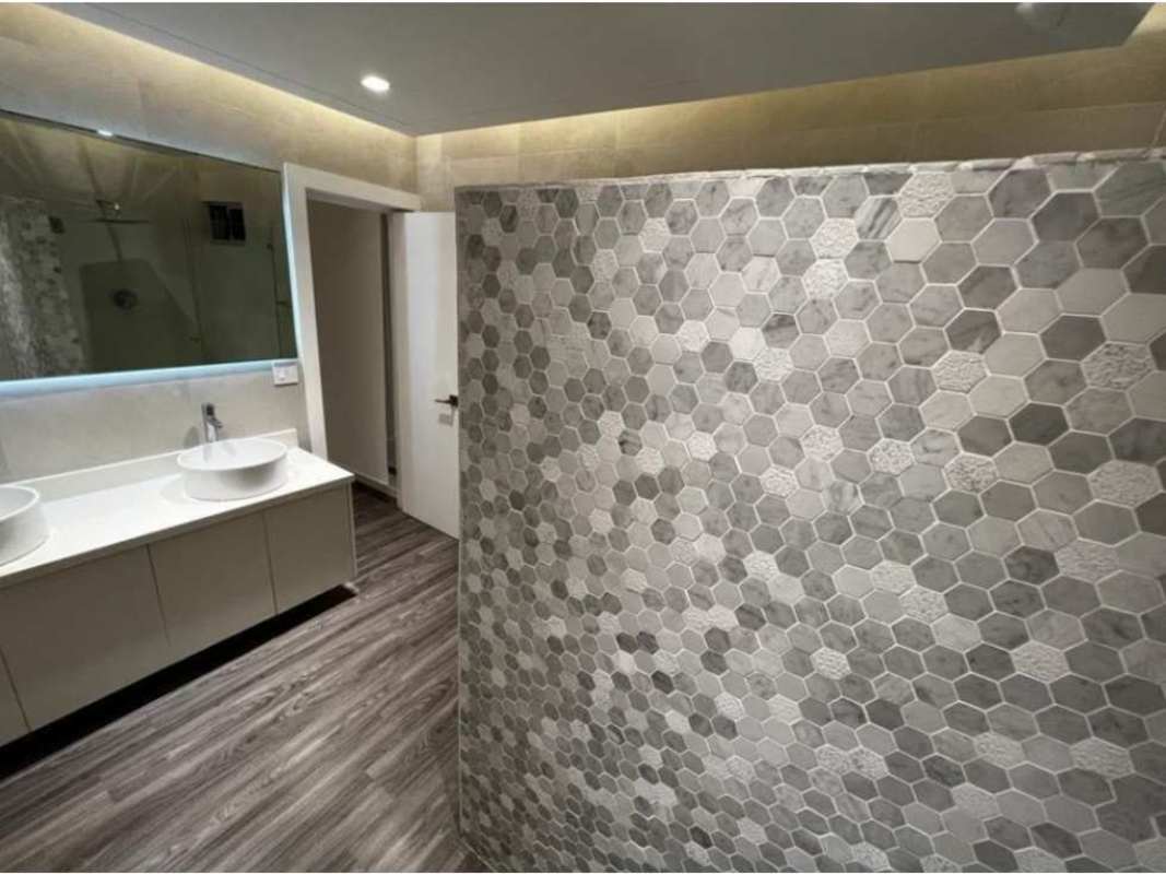 Contemporary bathroom with double sinks and glass shower PH Joy Tower San Francisco Panama