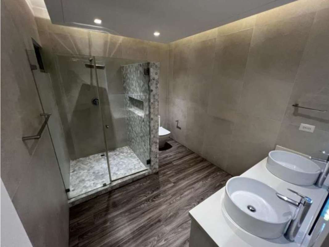 Modern kitchen with quartz countertops, built-in appliances at PH Joy Tower San Francisco Panama