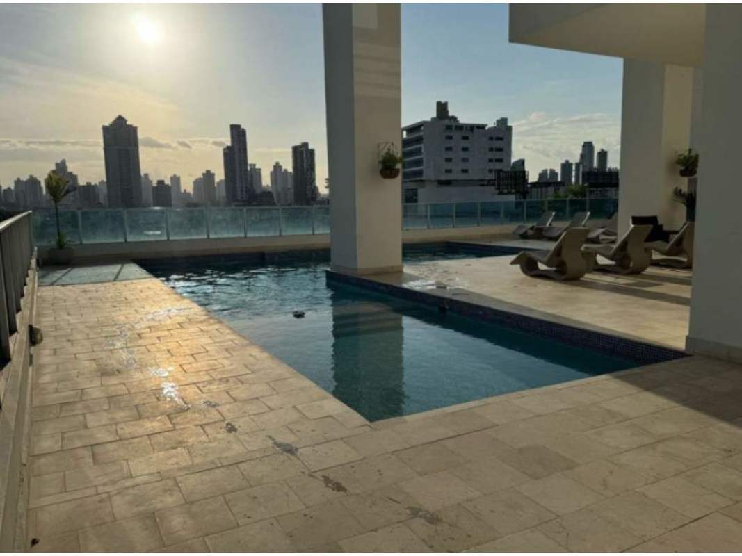 Bright living and dining open plan area with large windows at PH Joy Tower Panama City