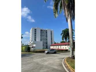 Facade of PH Albrook Point mid-rise apartment tower with balconies in Albrook Panama