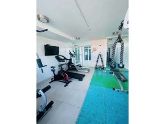 Modern outdoor pool with tiled deck at PH Albrook Point in Albrook Panama