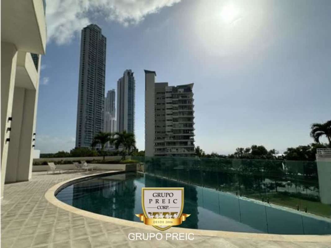 Secure outdoor playground for kids with slides and safe ground at PH Lumiere Costa del Este