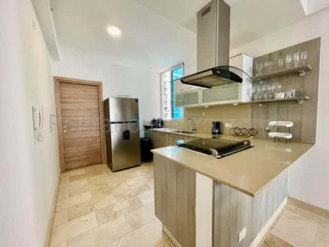 Furnished bedroom with marble floors, AC and closet with ocean view balcony in PH Bella Vista Panama City