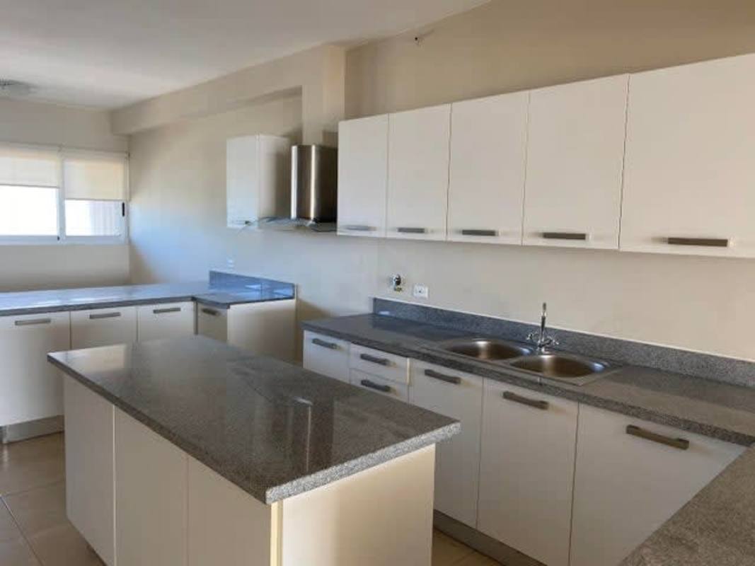 Master suite with walk-in closet and ocean views at PH BICSA Financial Center Panama City