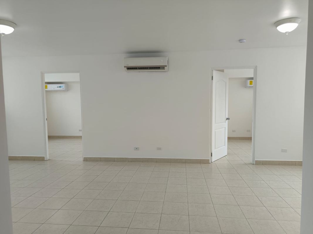 Modern tile-floored living space with AC and multiple room access PH Majestic Gardens, Panama City