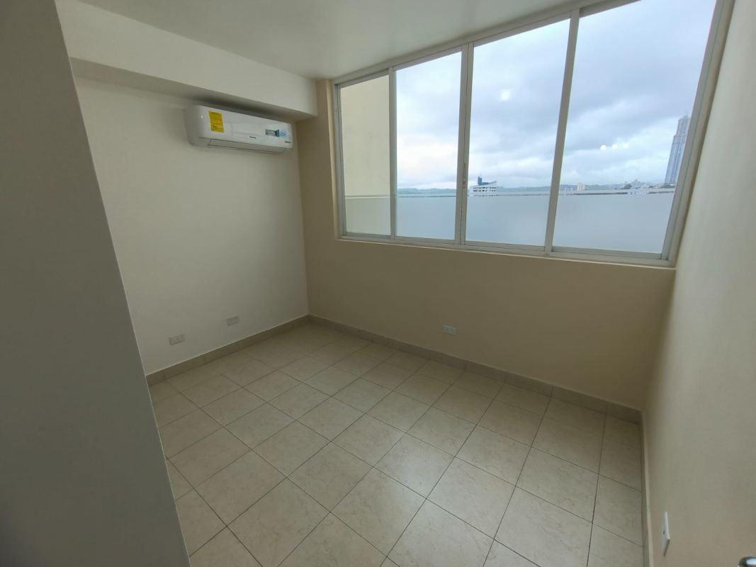 Bedroom with AC large window city skyline view in PH Majestic Gardens Panama