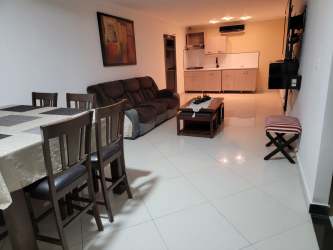 Bunk bed bedroom with porcelain floors and neutral decor at Las Lajas Gardens Coronado Panama beach rental