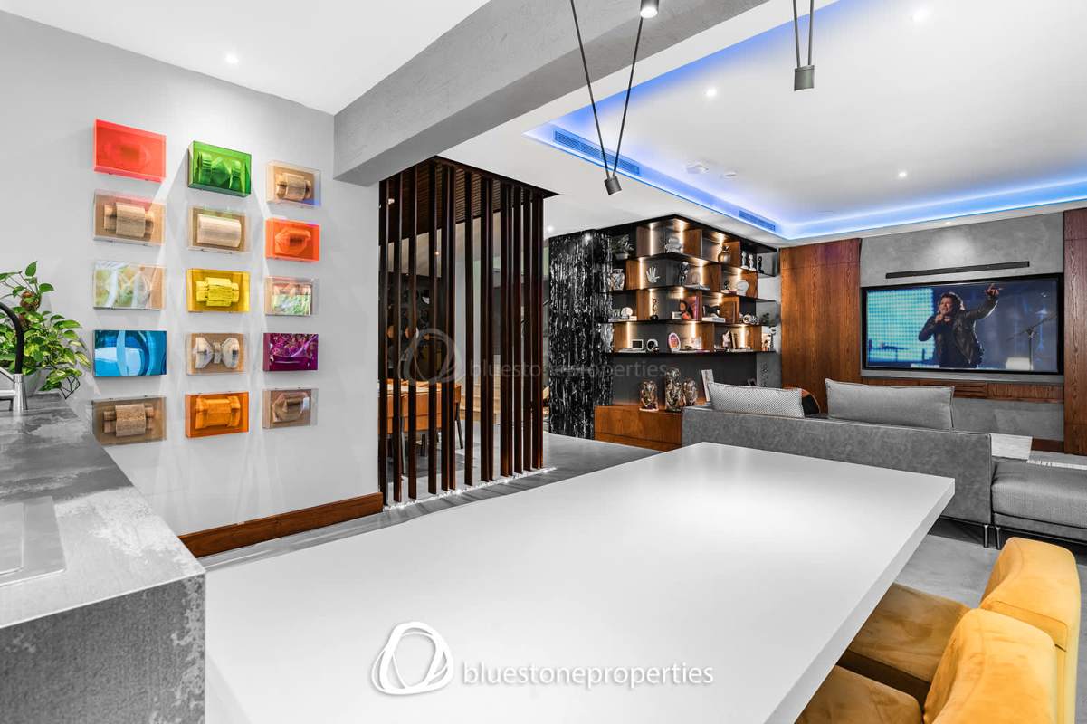 Elegant living room with marble floors and golf views Santa María Panama luxury house