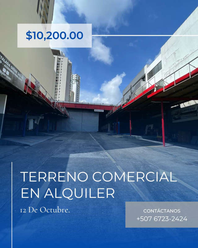 Large commercial lot with paved surface and industrial loading docks in central Panama City