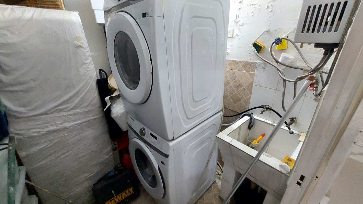 Bathroom with glass shower enclosure, vessel sink, decorative tiles in Condado del Rey Panama