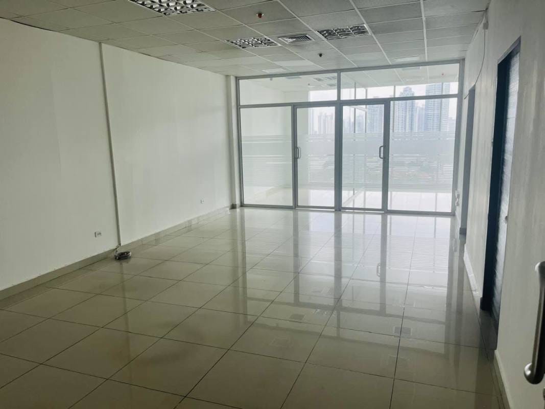 Enclosed conference room with glass partition inside renovated office at PH BICSA Obarrio