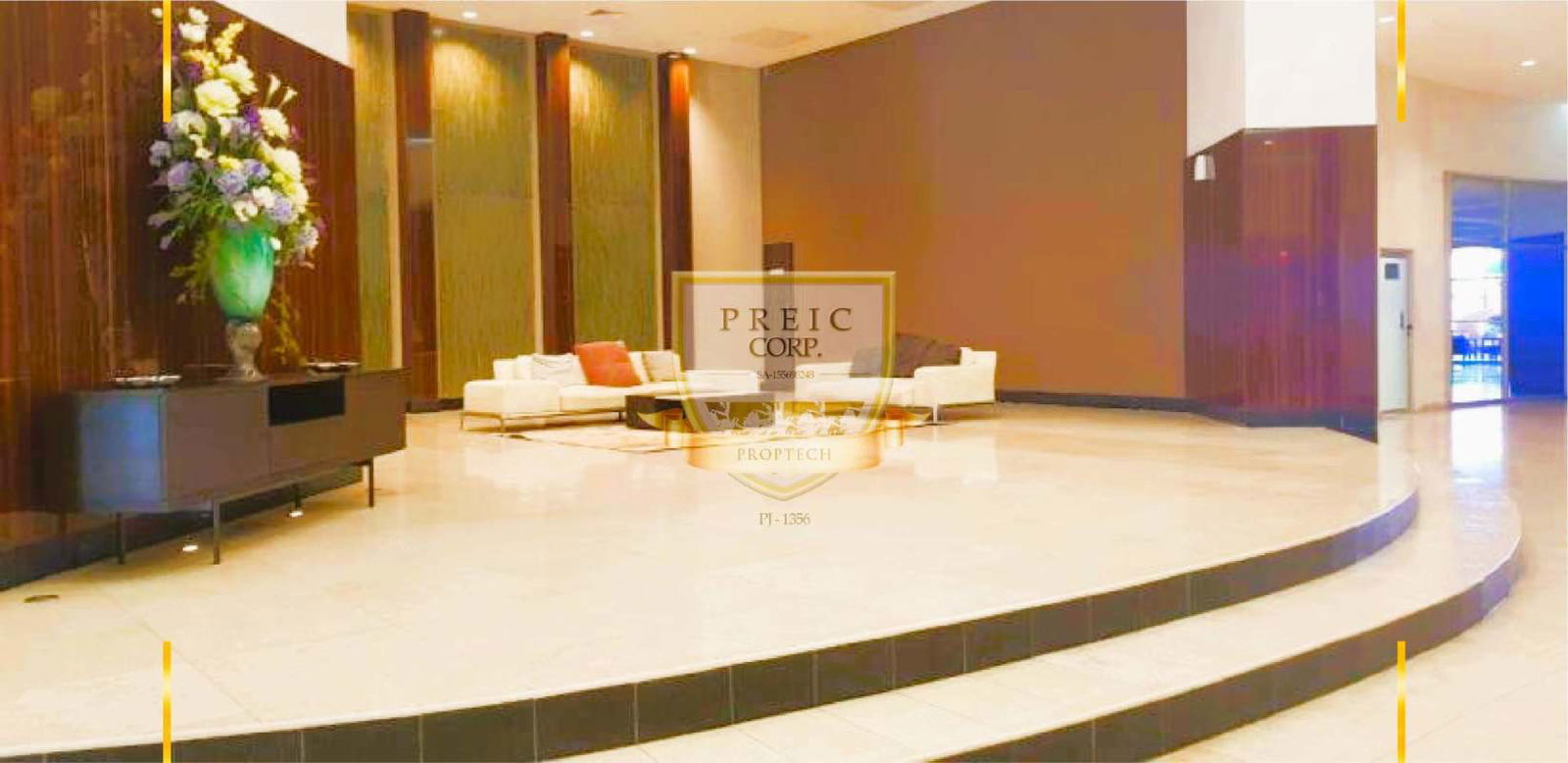 Fully equipped gym with large windows overlooking ocean at Oasis on the Bay Punta Pacífica Panama