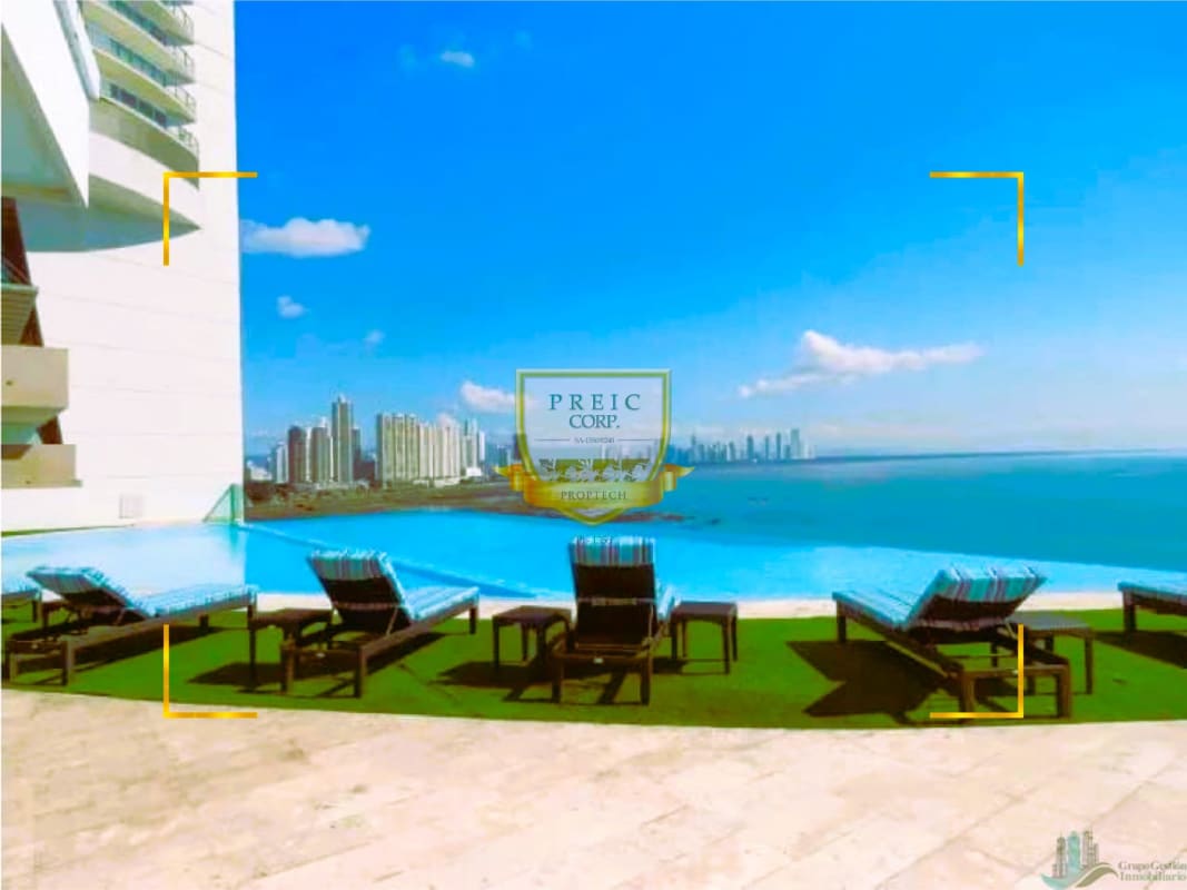 Spacious balcony with glass railing overlooking Panama skyline and Pacific ocean in Oasis on the Bay Punta Pacifica